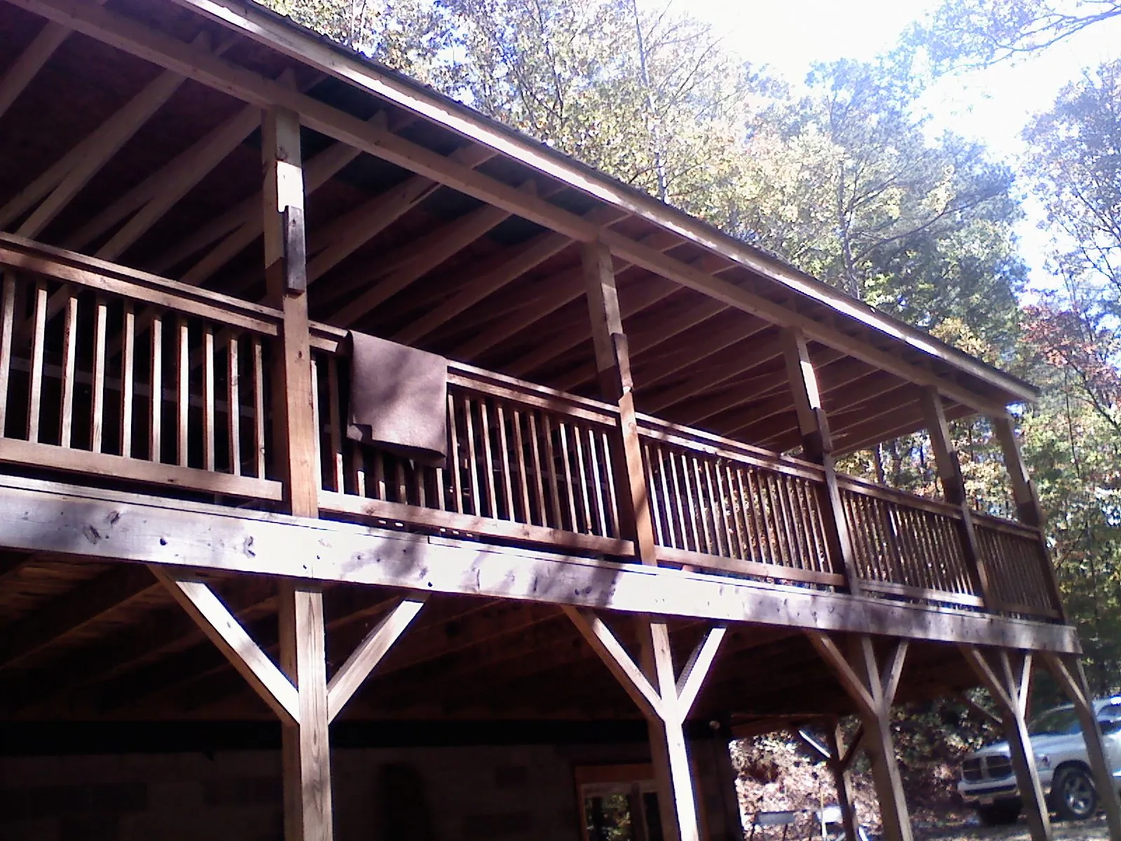 Timber framing under a new elevated porch and deck — Roof Leak Repair in Sammamish by Roofing Brothers